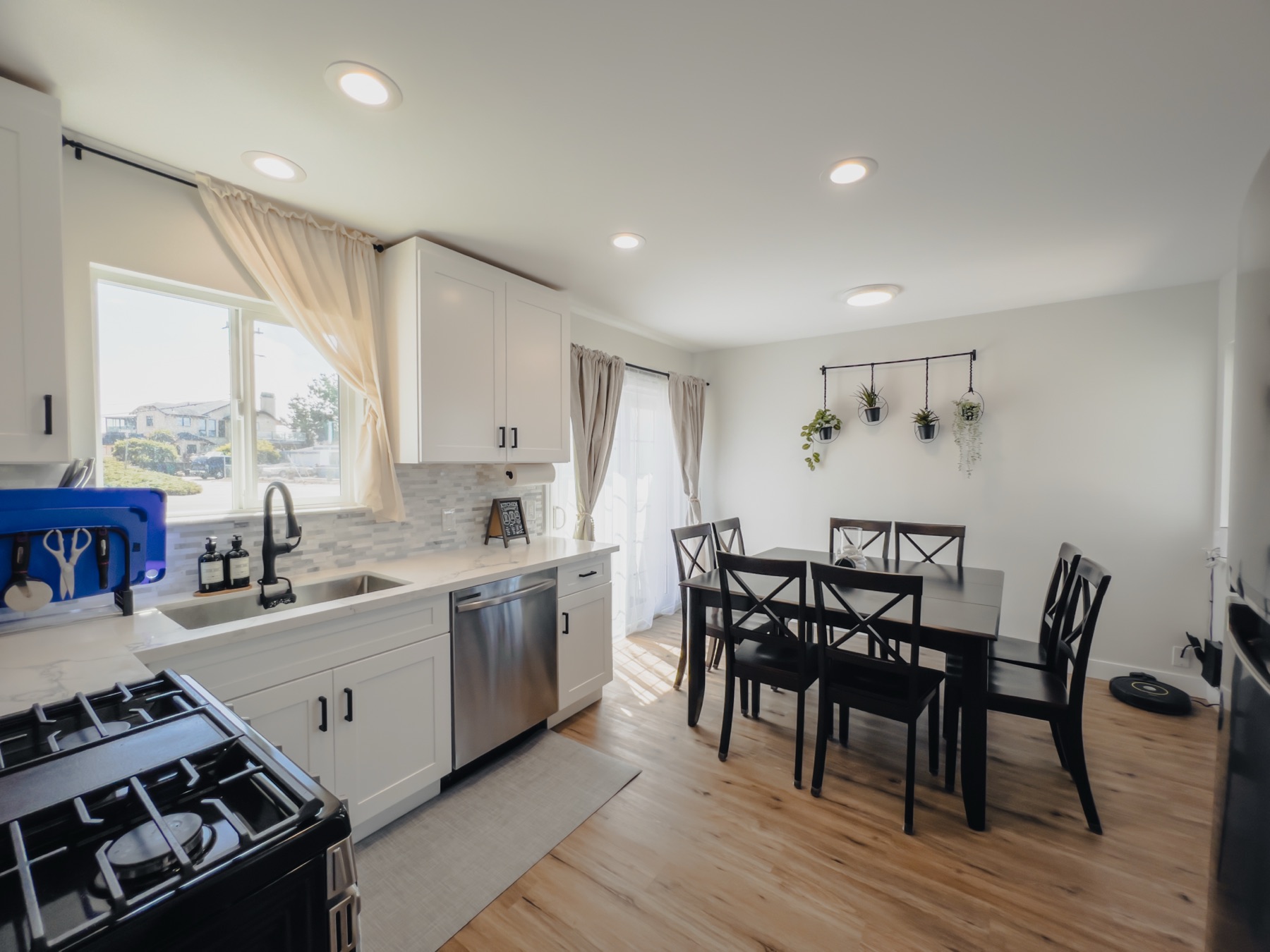 The home's open kitchen and dining area where meals are prepared and shared